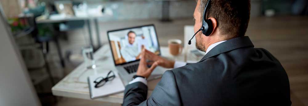 Remote employee on a conference call with colleague