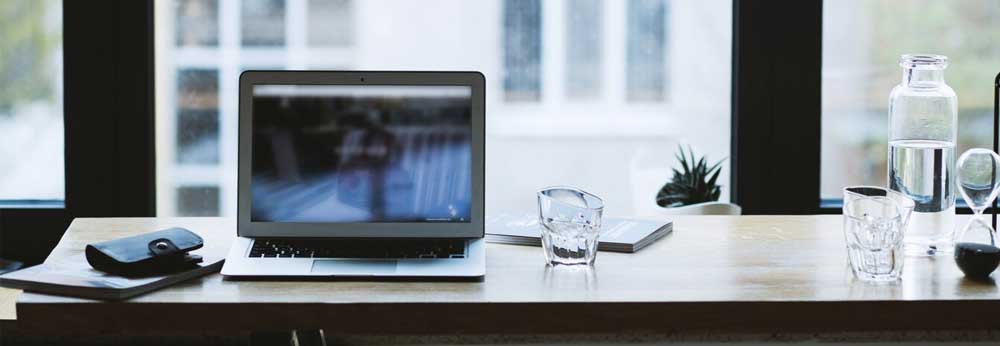 Laptop turned off on a desk