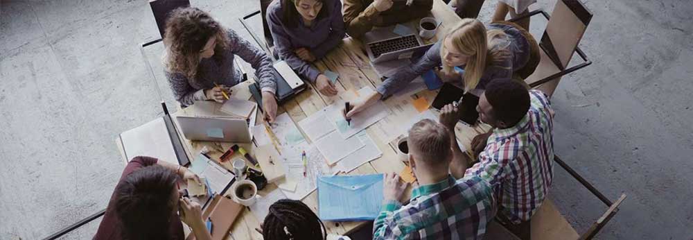 Employees collaborating together on a project