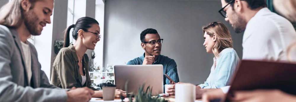 Group of employees discussing the power of productivity data